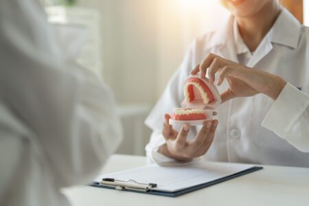 vecteezy dentist and patient discussion about planned teeth treatment 8570812 scaled