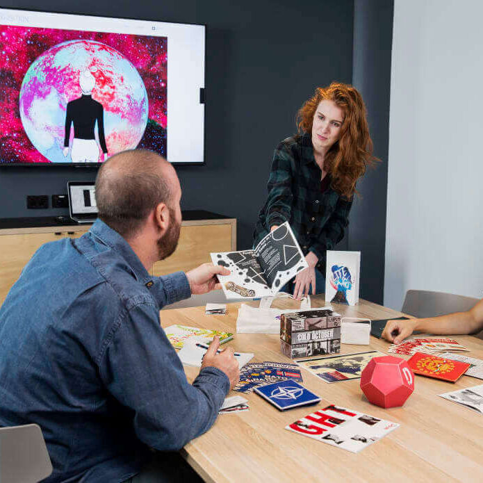 SAE UNIVERSITY COLLEGE 4 SAE AUS Image SYD Design Students Discussing Print Design